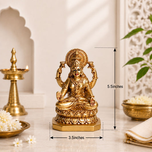 Gold-colored Hindu deity statue shown on a tabletop with dimension callouts indicating 3.5 inches width and 5.
